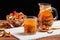 Rural still-life - compote with dried fruits from apples and pears on black background