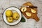 Rural still life ripe yellow quince fruits on the plate and cut