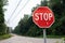 Rural Stop Sign in Cold Spring New York along an Empty Road with Green Trees