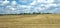 Rural summer landscape with mown field