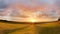 Rural sunset landscape panorama. Birds flying silhouette.