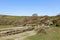 A rural Sussex view of the Cuckmere River, with a blue sky overhead