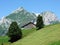 Rural traditional architecture and livestock farms on the slopes of the Alviergruppe mountain range