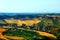 Rural view in Acquaviva Picena with rugged Marche landscape, meadows, ravines and scattered houses