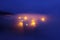 Rural village in Aramaio under fog at night