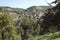 Rural village with plowed fields and apple orchards