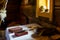 Rural vintage wood kitchen table with books and cooking utensils around