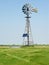 Rural Windmill Equipped with a Solar Panel