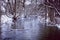 Rural winter landscape, river and snow