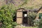 Rural wooden hut in the countryside with a garden full of plants Madeira, Portugal