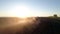 Rural work land by agriculture equipment or tractor at sunset field, nature farm