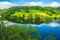 Rursee at Eifel National Park, Germany. Scenic view of lake Rursee and surrounded green hills in North Rhine-Westphalia