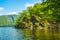 Rursee at Eifel National Park, Germany. Scenic view of lake Rursee and surrounded green hills in North Rhine-Westphalia