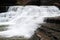 The rushing waters of the Robert H Treman Falls