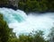 The rushing wild stream of Huka Falls near Lake Taupo, New Zealand.