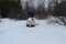 Rusia, Saratov - january,2020: Man driving snowmobile in snowyfield. preparing the ski route