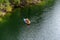 Ruskeala, Russia - June 14, 2022: View of the Great Marble Canyon of Ruskeala Mountain Park in Karelia. People are boating on the