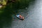 Ruskeala, Russia - June 14, 2022: View of the Great Marble Canyon of Ruskeala Mountain Park in Karelia. People are boating on the