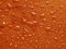 Russet orange colored metallic surface