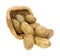 Russet potatoes spilling from basket