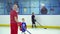 Russia, 2017: Coach children`s hockey team teaches children