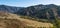 Russia, Aliai, panorama of the autumn landscape. Mountains, fields, and a road