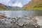 Russia, Arkhyz. Lake Zaprudnoye in autumn in cloudy day