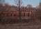 Russia, early spring, authentic original landscape, Peterhof, Suvorovsky town. Textured red brick building