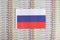 Russia flag on a background from dollar banknotes. Concept of the relationship of the Russian money in relation to the dollar, the