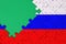 Russia flag is depicted on a completed jigsaw puzzle with free green copy space on the left side