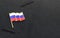 Russia flag lapel pin on the collar of a suit