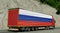 Russia- import-export concept. Truck carrying goods with the flag of Russia