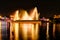 Russia, Irkutsk - July 19, 2019: Colorfull reflection of fountain and lights in Angara river, night photo near