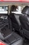 Russia, Izhevsk - August 14, 2020: Geely showroom. Back passenger seats and black leather driver seat inside Atlas car with seat