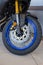 Russia, Izhevsk - August 23, 2019: Yamaha motorcycle shop. Front air fork and motorcycle wheel of the new XT1200