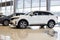 Russia, Izhevsk - December 28, 2020: KIA showroom. New modern Sorento car in dealer showroom. Front and side view