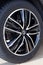 Russia, Izhevsk - February 19, 2021: Nissan showroom. The wheel of Murano car. Alloy wheel and Bridgestone tyre. Prestigious cars