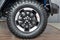 Russia, Izhevsk - March 4, 2022: Jeep showroom. The wheel of Wrangler Unlimited off-road car. Alloy wheel and BFGoodrich