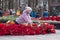 Russia, Izhevsk - May 9, 2018: The girl is laying flowers at the memorial to the fallen soldiers of World War II