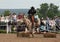 RUSSIA - JUNE 13 2010: Man jump on horse over an obstacle,  equestrian sports competitions