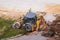 Russia, Kaluga - OCTOBER 27, 2020: Tractor breaking the old asphalt with a bucket before the construction