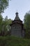 Russia, Karelia: 06.07.2019: White nights. Dawn on Lake Muezero. Trinity Monastery on Trinity Island, old wooden church