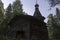 Russia, Karelia: 06.07.2019: White nights. Dawn on Lake Muezero. Trinity Monastery on Trinity Island, old wooden church of St.