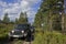 Russia, Karelia, July 16, 2015: photo jeep wrangler on a forest road in Karelia