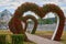 Russia, Kazan June 2019. Decorative installations in the form of hearts with red natural flowers on the square in front of the Kaz