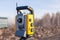 Russia Kemerovo 2019-03-15. Land surveyor equipment. Robotic total station theodolite standing on tripod. Equipment used for