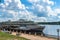 Russia, Kostroma, July 2020. Passenger motor ship at the pier on the river.