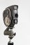 Russia, Krasnoyarsk, December 2019: Soviet cinema camera quartz 2M on a tripod, white background