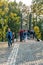 Russia, Kronstadt, September 2020. There are many people on the suspended metal bridge.