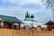 Russia, Leningrad region, December 2020. Courtyard of the Orthodox monastery in cloudy weather.